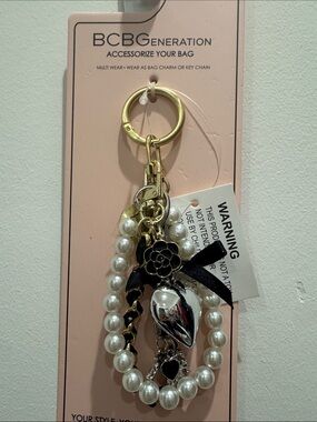 BCBGeneration Gold-Tone Pearl & Black Ribbon Heart Key Charm